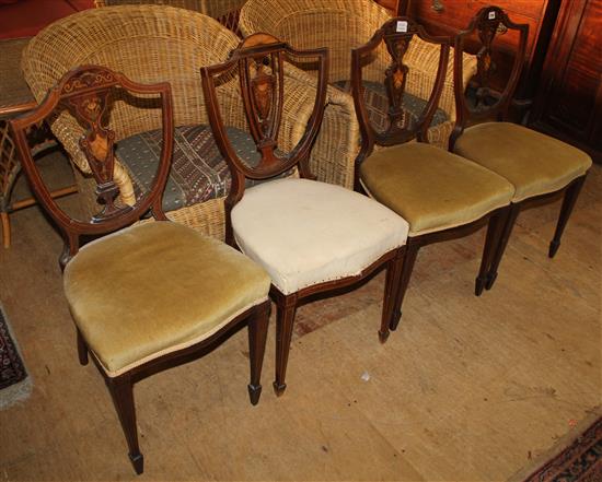 Two wicker armchairs (with padded cushions), cane two-seater settee & a cane coffee table(-)